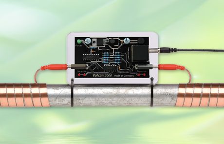 Water testing device connected to pipes for laboratory analysis.