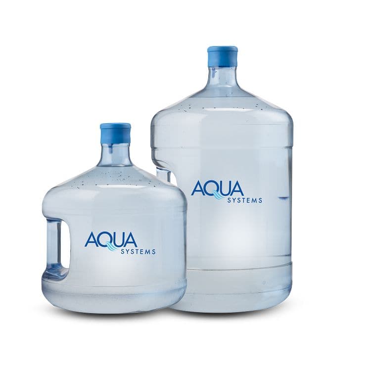 Two large Aqua Systems water bottles with blue caps, clear water inside, on a white background.