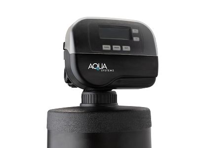 Aqua Systems water treatment control valve with digital display and buttons.