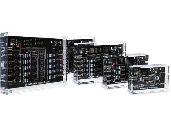 Collection of Vulcan S500 water testing devices in clear acrylic cases.
