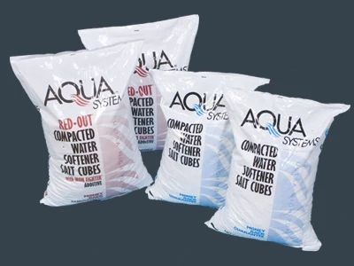 Aqua Systems water softener salt cubes in white packaging with blue and red accents.